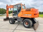 Pelle sur pneus Doosan DX140W 2010 – 14,8T – 7857h – Occasion – Image 2