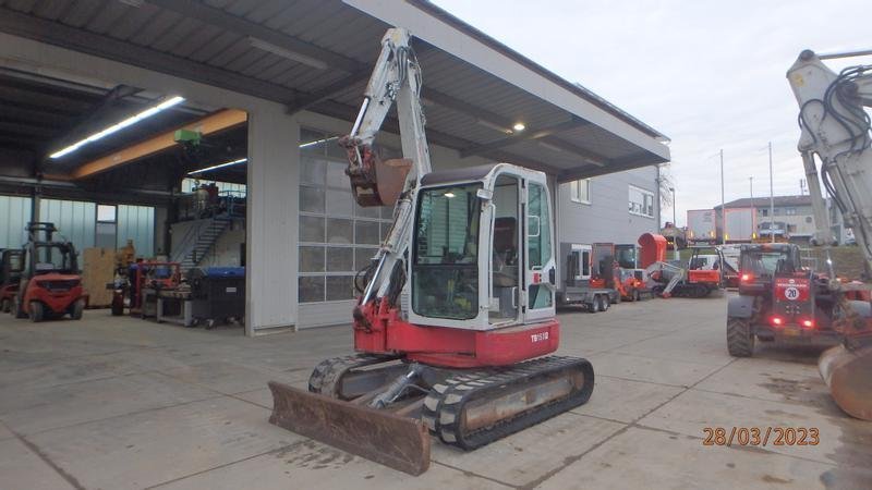 Takeuchi-153-011 Takeuchi d’occasion 153 FR (2008) – Mini Pelle 5,6T – 5225 h – 3 Godets – Image 1